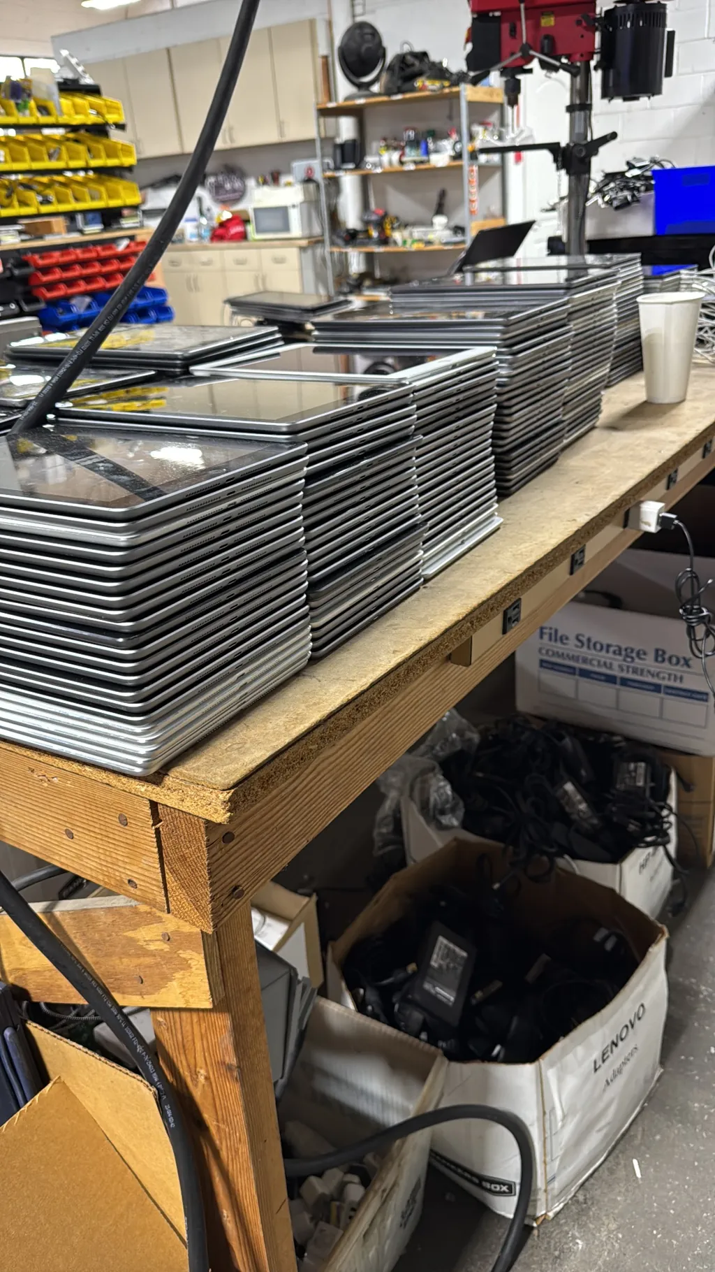 tablets stacked on bench itad