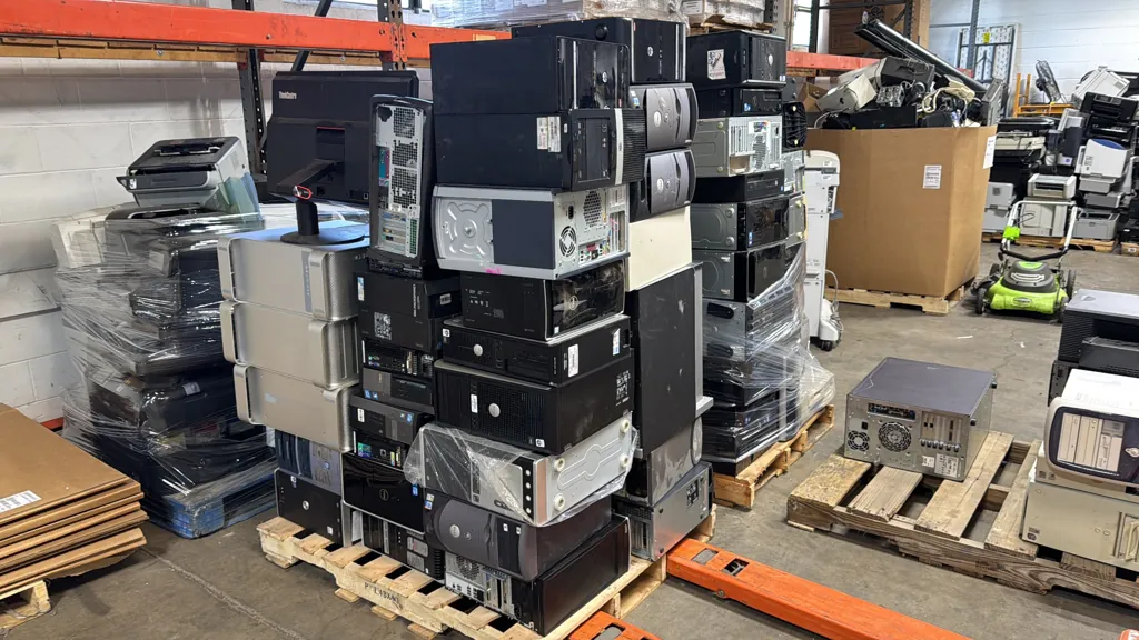 desktop computers towers on pallets